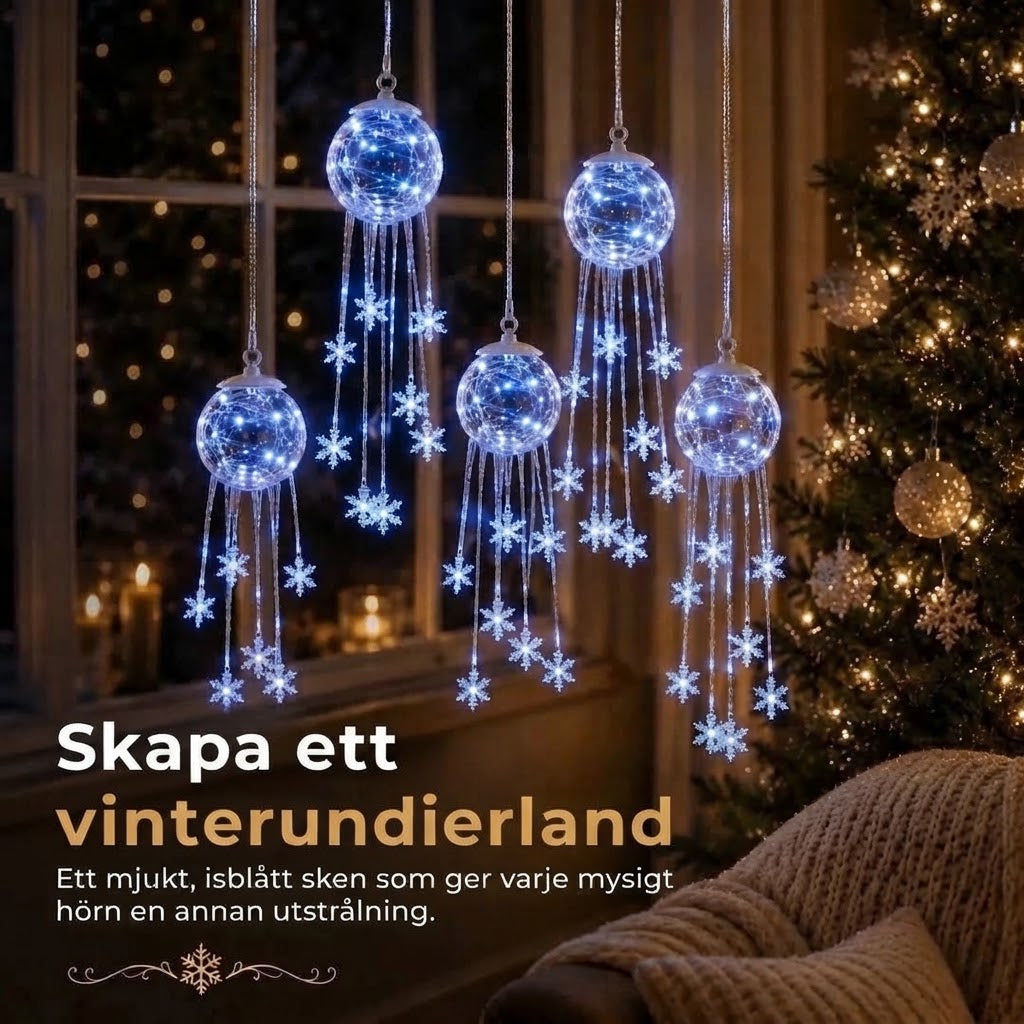 LED-julkula med hängande snöflingor