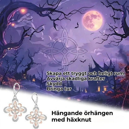 Silverfärgade örhängen med häxknut