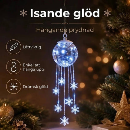 LED-julkula med hängande snöflingor
