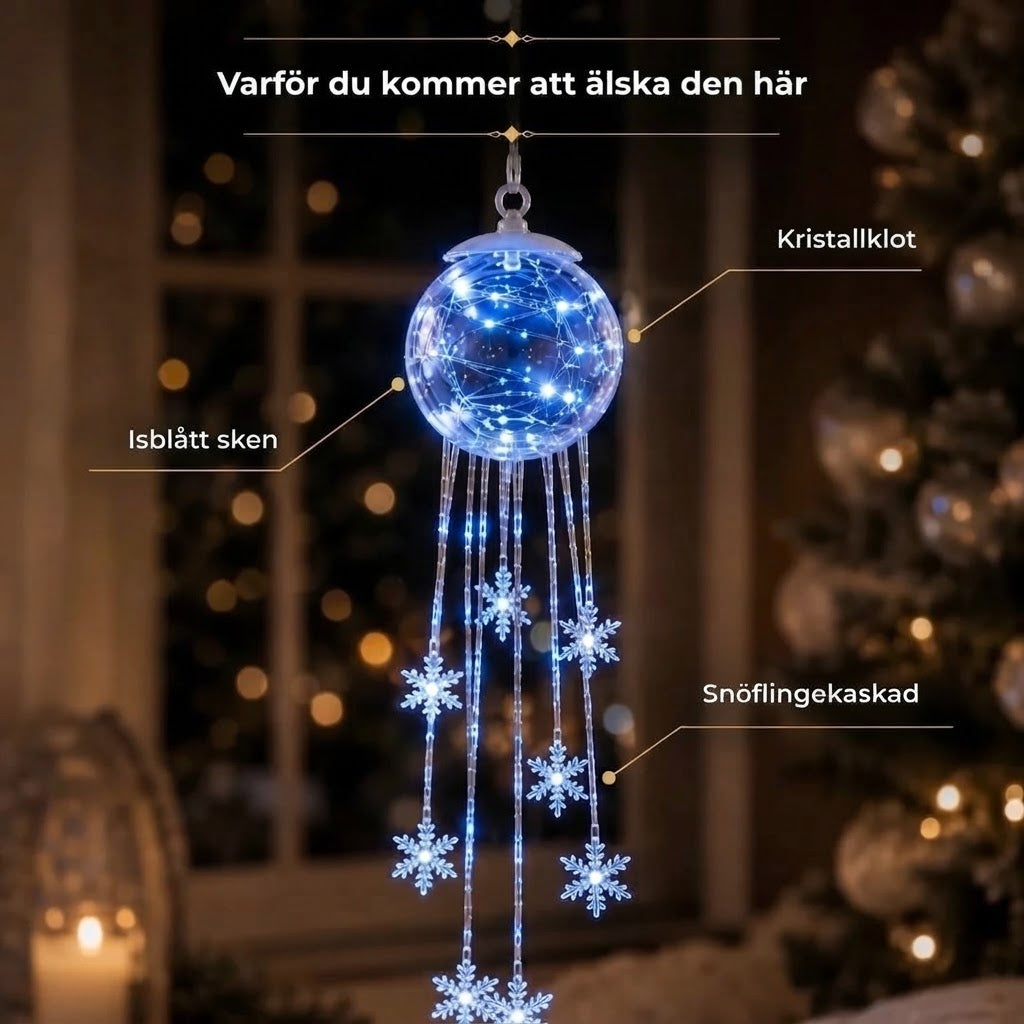 LED-julkula med hängande snöflingor